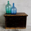 Antique black solid wood trunk with original handles (France, c.1920)