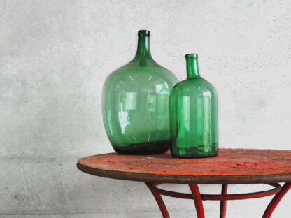 Antique round red metal outdoor table (France, c.1920).