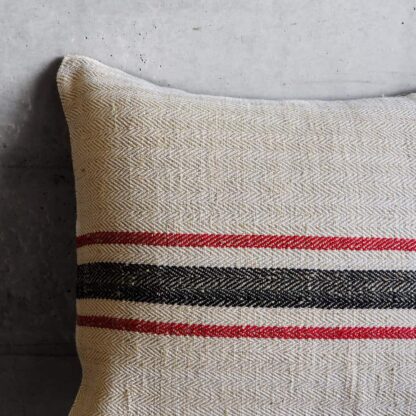 Linen stripe cushion with red and black stripe