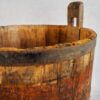 Antique oak wood bucket used during the grape harvest (France, c.1950).