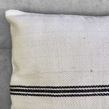 Black striped cushion in natural linen