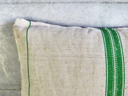 Green striped cushion in natural linen handmade with old flour sacks