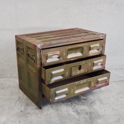 Green metal chest of drawers with original green patina (c. 1940).