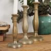 Candelero antiguo de metal (c.1900). Conjunto de 3 piezas.