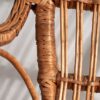 Silla mecedora antigua de mimbre (c.1930)