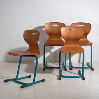 Vintage turquoise blue school chairs (c.1950). Set of 4 pieces