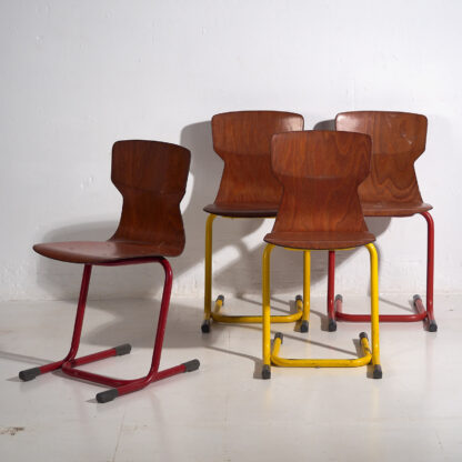 Vintage industrial chairs for living room in yellow and red (c.1950). Set of 4 pieces