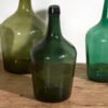 Antique green demijohns (c.1920). 3-piece set #24 - Image 4