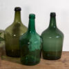 Antique green demijohns (c.1920). 3-piece set #24
