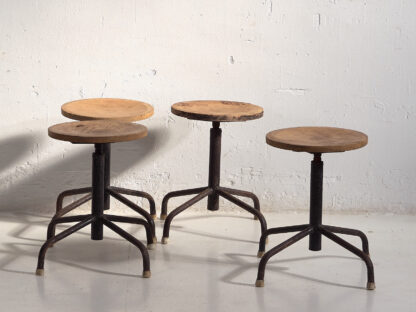 Industrial style round stools (c.1950). Set of 4 pieces