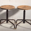 Industrial style round stools (c.1950). Set of 4 pieces